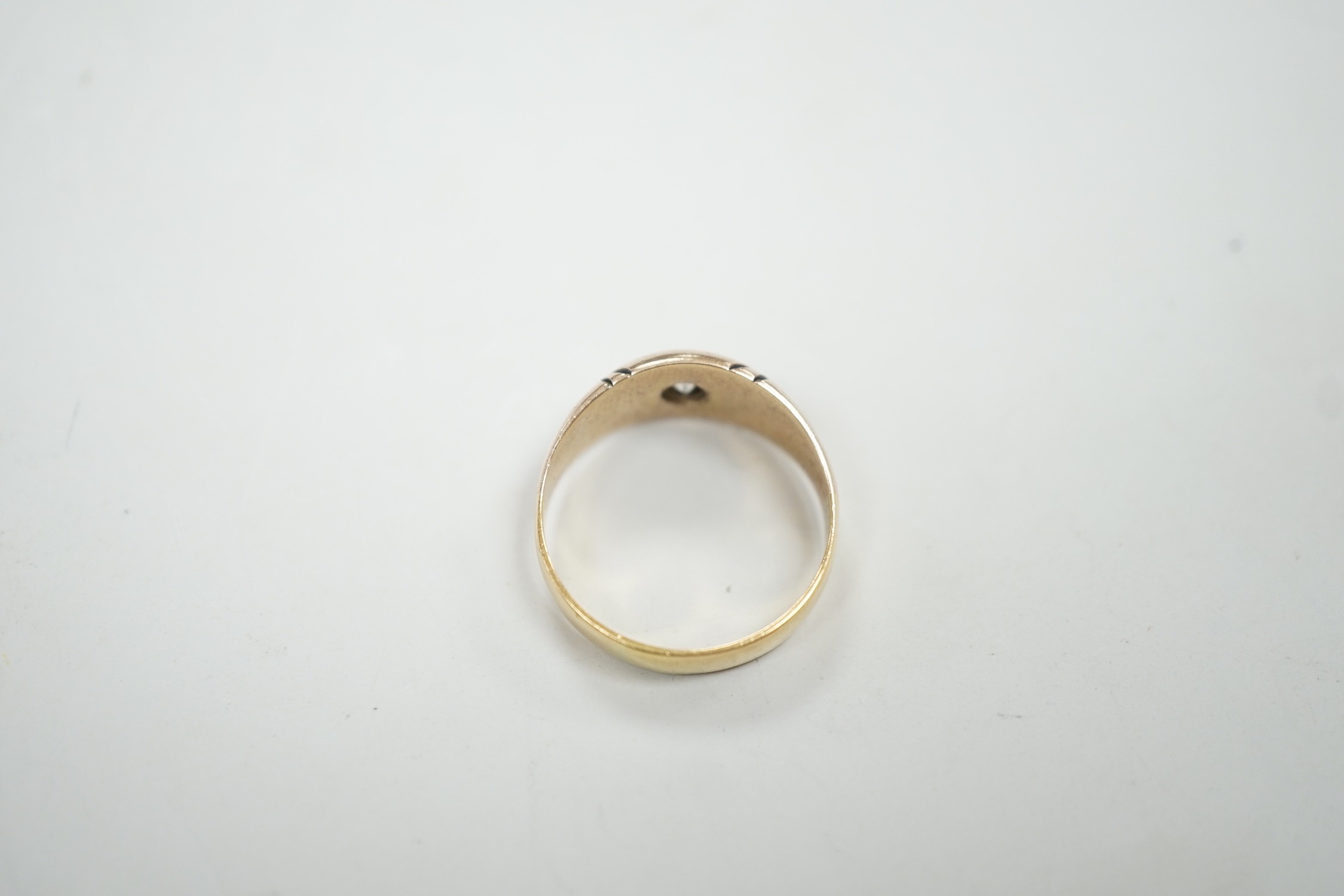 A Victorian 18ct gold and gypsy set solitaire diamond ring, size O, gross weight 3.9 grams.